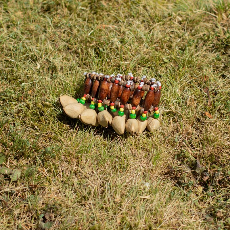 Kenari-skal handskakare - skallra-armband (15 stycken)